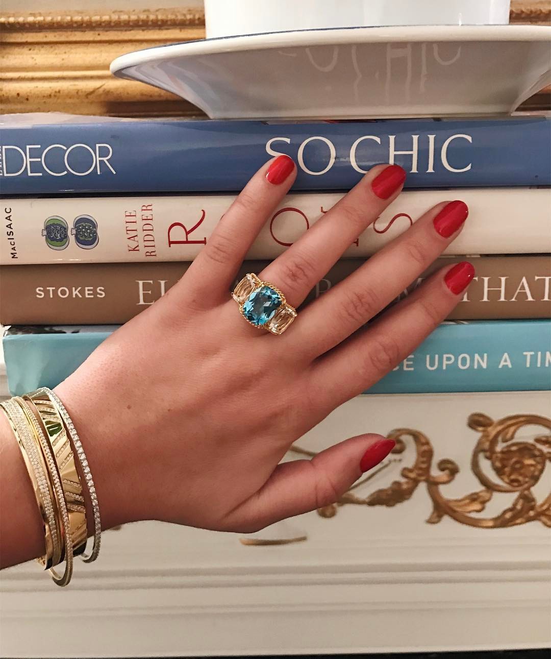 18kt Yellow Gold Three Stone Ring with Pink Topaz and Blue Topaz and Rope Twist Border