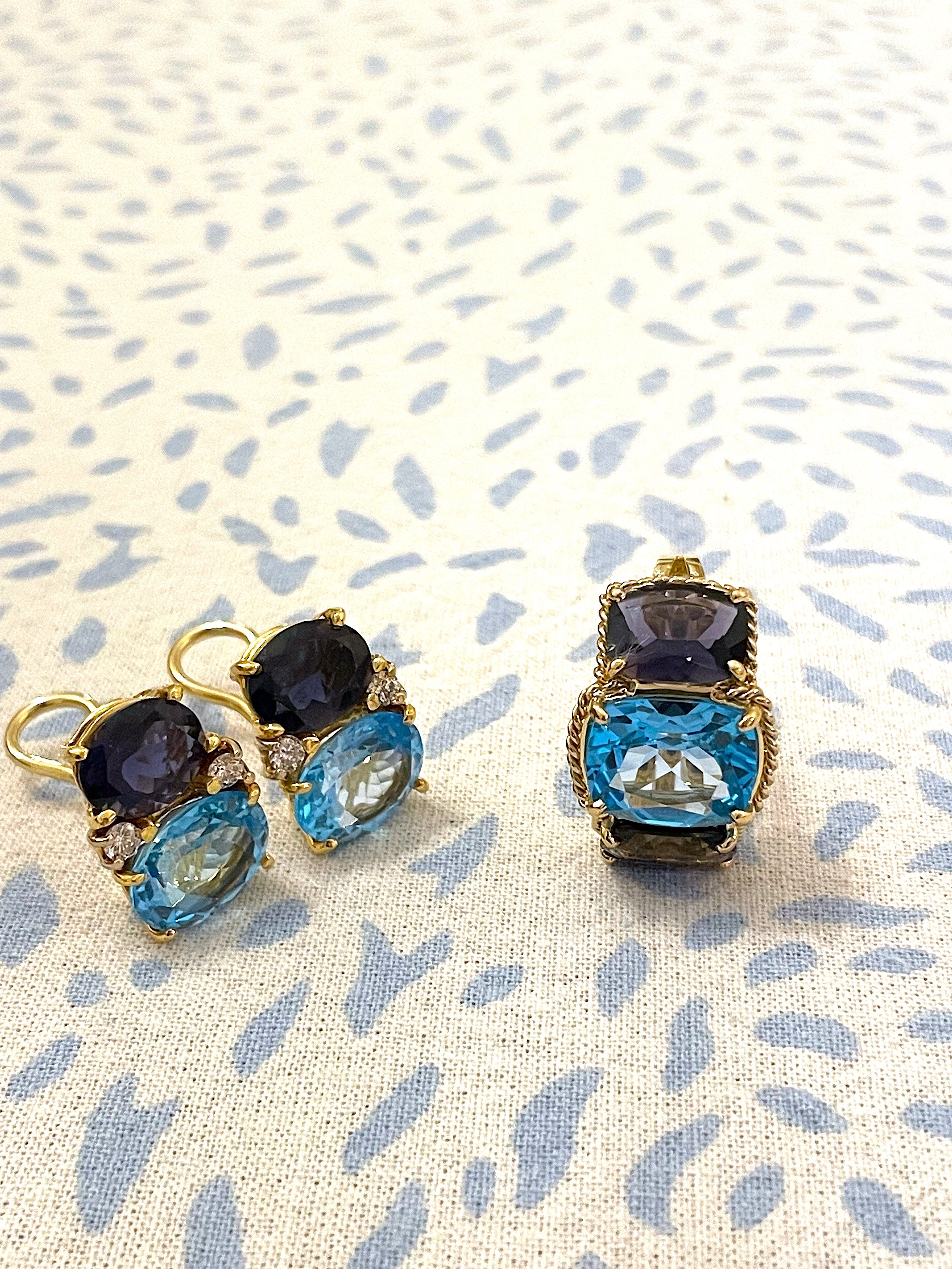 18kt Yellow Gold Three Stone Ring with Pink Topaz and Blue Topaz and Rope Twist Border