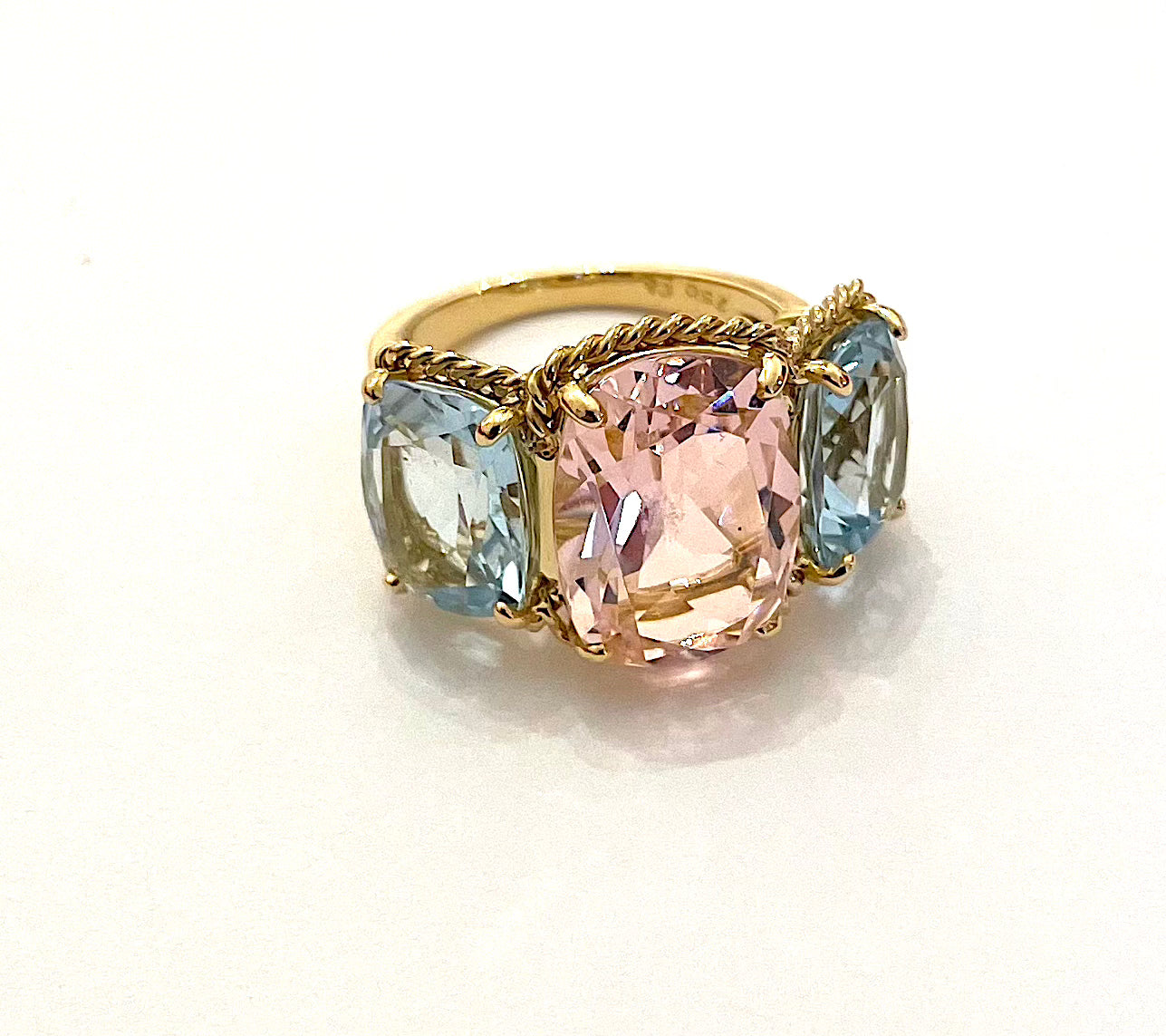 18kt Yellow Gold Three Stone Ring with Pink Topaz and Blue Topaz and Rope Twist Border