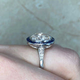 Platinum Cushion Cut Diamond and Sapphire Halo set Ring