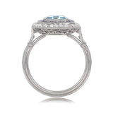 Platinum Cushion Cut Diamond and Sapphire Halo set Ring