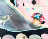 Elegant Three-Stone Ring with Gold Rope Twist Border