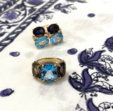 Blue Topaz and Iolite Three Stone Ring with Rope Twist Border