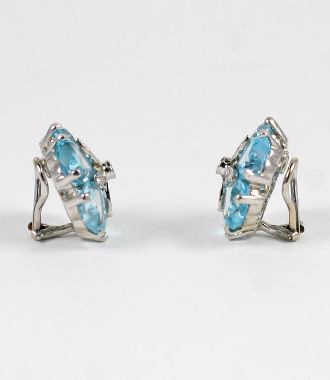 18kt White Gold Sand Dollar Earring with Blue Topaz and Diamonds