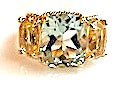 Elegant Three Stone Garnet Ring with Gold Rope Twist Border