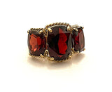 Elegant Three Stone Garnet Ring with Gold Rope Twist Border