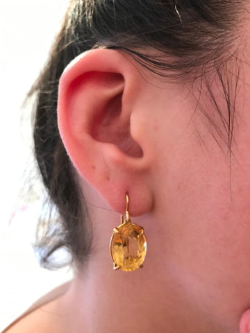 Stone shop earrings hanging