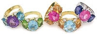 Elegant Three-Stone Ring with Gold Rope Twist Border with Blue Topaz and Peridot