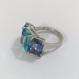 18kt White Gold Three Stone Emerald Cut Ring with Blue Topaz and Iolite